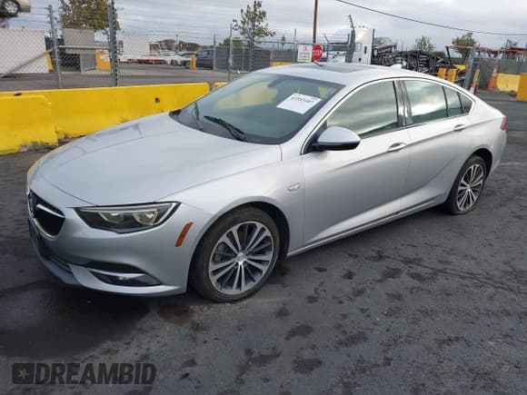 ✅ 2018 Buick Regal Preferred II • VIN: W04GM6SX9J1147035 • Lot: 43553107. Listed on IAAI with 242,083 mi. Free auction sales archive from the USA and detailed vehicle history report at DreamBid. Image 2.