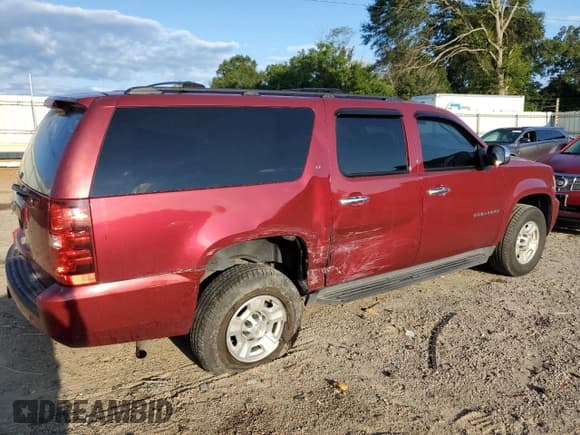 ✅ 2010 Chevrolet Suburban LT • VIN: 1GNZKMEGXAR211239 • Lot: 70322265. Wystawiony na Copart z przebiegiem 174 586 mil. Bezpłatny archiwum sprzedaży aukcyjnych z USA i szczegółowy raport historii pojazdu na DreamBid. Zdjęcie 3.