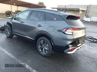 ✅ 2023 Kia Sportage SX-Prestige • VIN: KNDPXCAG9P7055572 • Лот: 43586302. Опубликован ранее на IAAI с пробегом 21 700 миль. Бесплатный доступ к архиву аукционных продаж из США и подробный отчёт об истории автомобиля на DreamBid. Изображение 3.