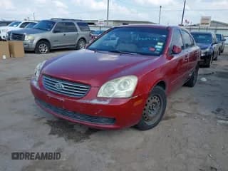 ✅ 2008 Kia Optima LX • VIN: KNAGE123385258103 • Лот: 43509138. Опубликован ранее на IAAI с пробегом 182 266 миль. Бесплатный доступ к архиву аукционных продаж из США и подробный отчёт об истории автомобиля на DreamBid. Изображение 2.