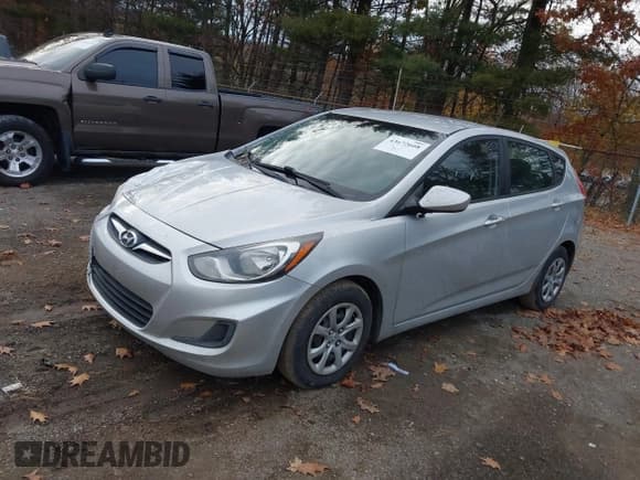 ✅ 2014 Hyundai Accent GS • VIN: KMHCT5AE4EU185824 • Lot: 43672608. Listed on IAAI with 199,283 mi. Free auction sales archive from the USA and detailed vehicle history report at DreamBid. Image 2.