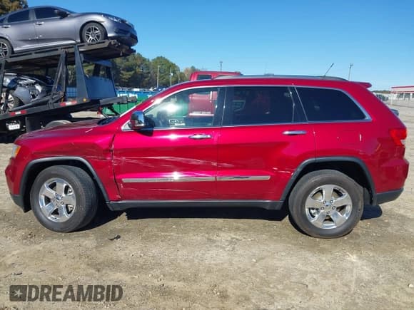 ✅ 2013 Jeep Grand Cherokee Limited • VIN: 1C4RJEBG7DC626452 • Lot: 43589955. Listed on IAAI with 105,171 mi. Free auction sales archive from the USA and detailed vehicle history report at DreamBid. Image 14.