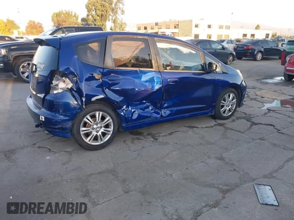 ✅ 2009 Honda Fit Sport • VIN: JHMGE88489S037061 • Lot: 43812358. Listed on IAAI with 192,661 mi. Free auction sales archive from the USA and detailed vehicle history report at DreamBid. Image 4.