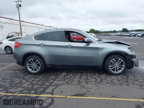 ✅ 2014 BMW X6 xDrive50i • VIN: 5UXFG8C59EL592496 • Lot: 42904148. Wystawiony na IAAI z przebiegiem 160 148 mil. Bezpłatny archiwum sprzedaży aukcyjnych z USA i szczegółowy raport historii pojazdu na DreamBid. Zdjęcie 13.