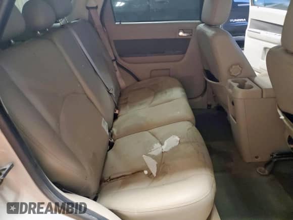 2009 Mercury Mariner Premier с VIN 4M2CU87769KJ12378, выставлен на аукционе Copart как лот 69630725 с пробегом 67 949 миль миль и На запчасти • Non repairable. История ставок и продаж доступна на DreamBid. Изображение 11.