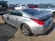 ✅ 2003 Nissan 350Z Touring • VIN: JN1AZ34D43T103694 • Lot: 42602625. Wystawiony na IAAI z przebiegiem 271 699 mil. Bezpłatny archiwum sprzedaży aukcyjnych z USA i szczegółowy raport historii pojazdu na DreamBid. Zdjęcie 3.