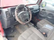 ✅ 2005 Jeep Wrangler Unlimited • VIN: 1J4FA44S15P312587 • Lot: 68176985. Listed on Copart with 186,612 mi. Free auction sales archive from the USA and detailed vehicle history report at DreamBid. Image 8.