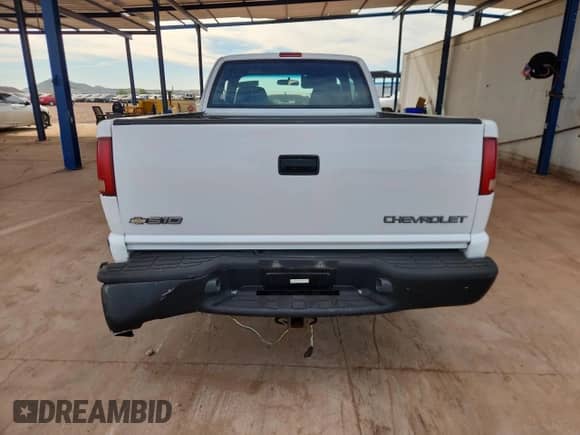 2003 Chevrolet S-10 LS с VIN 1GCDT19X038185607, выставлен на аукционе Copart как лот 82764965 с пробегом 72 381 миль миль и Списание • Salvage title. История ставок и продаж доступна на DreamBid. Изображение 6.