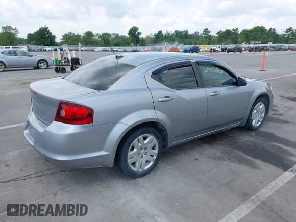 2013 Dodge Avenger SE with VIN 1C3CDZAB2DN540291, listed as a IAAI auction lot 42948168 with 148,169 mi miles and . Bid and sale history available at DreamBid. Image 4.