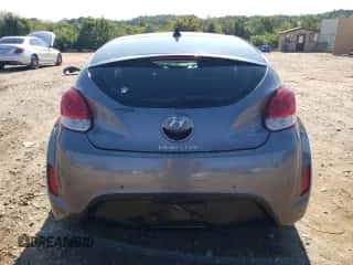 2016 Hyundai Veloster z VIN KMHTC6AD7GU248608, wystawiony jako Copart lot #65809693 z przebiegiem 104 784 mil mil oraz . Historia ofert i sprzedaży dostępna na DreamBid. Obrazek 6.
