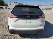 ✅ 2022 Ford Edge SE • VIN: 2FMPK4G94NBA85138 • Lot: 76874684. Listed on Copart with 49,272 mi. Free auction sales archive from the USA and detailed vehicle history report at DreamBid. Image 6.