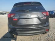 ✅ 2014 Mazda CX-5 Touring • VIN: JM3KE4CY5E0306659 • Lot: 80895895. Wystawiony na Copart z przebiegiem 140 340 mil. Bezpłatny archiwum sprzedaży aukcyjnych z USA i szczegółowy raport historii pojazdu na DreamBid. Zdjęcie 6.