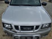 ✅ 2002 Isuzu Rodeo • VIN: 4S2CM57W024315499 • Лот: 75885194. Опубликован ранее на Copart с пробегом 183 425 миль. Бесплатный доступ к архиву аукционных продаж из США и подробный отчёт об истории автомобиля на DreamBid. Изображение 12.