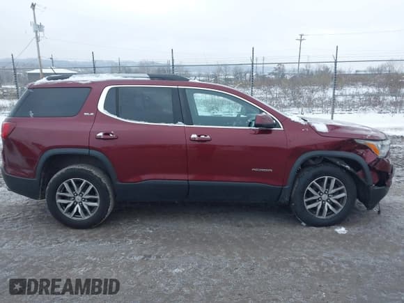 ✅ 2017 GMC Acadia SLE • VIN: 1GKKNSLS4HZ321473 • Lot: 43823727. Listed on IAAI with 138,402 mi. Free auction sales archive from the USA and detailed vehicle history report at DreamBid. Image 13.