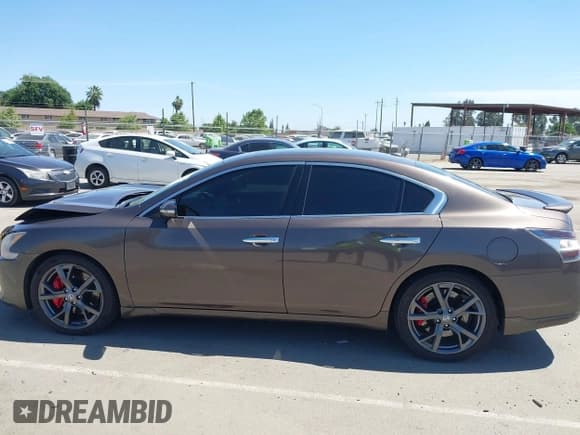 ✅ 2013 Nissan Maxima S • VIN: 1N4AA5AP0DC847265 • Lot: 42279613. Listed on IAAI with 128,765 mi. Free auction sales archive from the USA and detailed vehicle history report at DreamBid. Image 14.