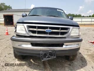 ✅ 1999 Ford Expedition XLT • VIN: 1FMPU18L1XLA09625 • Lot: 65663194. Listed on Copart with Not provided. Free auction sales archive from the USA and detailed vehicle history report at DreamBid. Image 5.