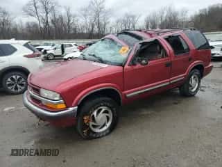 2001 Chevrolet Blazer LT z VIN 1GNDT13W012153280, wystawiony jako Copart lot #85602694 z przebiegiem 119 810 mil mil oraz Szkoda całkowita • Salvage title. Historia ofert i sprzedaży dostępna na DreamBid. Obrazek 1.