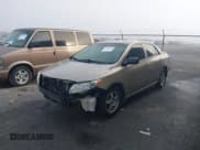 ✅ 2009 Toyota Corolla LE • VIN: 1NXBU40E99Z020989 • Lot: 43728473. Listed on IAAI with 228,636 mi. Free auction sales archive from the USA and detailed vehicle history report at DreamBid. Image 2.