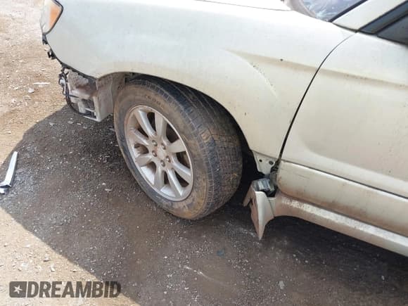 ✅ 2007 Subaru Forester X • VIN: JF1SG65617H723412 • Лот: 42836322. Опубликован ранее на IAAI с пробегом 74 277 миль. Бесплатный доступ к архиву аукционных продаж из США и подробный отчёт об истории автомобиля на DreamBid. Изображение 14.