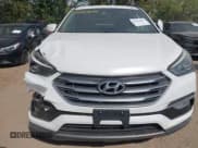✅ 2017 Hyundai Santa Fe 2.4L • VIN: 5NMZUDLB6HH022905 • Lot: 43361656. Wystawiony na IAAI z przebiegiem 145 406 mil. Bezpłatny archiwum sprzedaży aukcyjnych z USA i szczegółowy raport historii pojazdu na DreamBid. Zdjęcie 13.