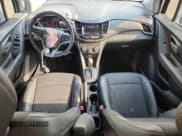 ✅ 2022 Chevrolet Trax LT • VIN: KL7CJLSM9NB560989 • Lot: 81088835. Listed on Copart with 64,218 mi. Free auction sales archive from the USA and detailed vehicle history report at DreamBid. Image 8.