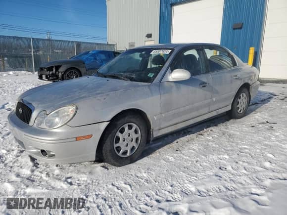 2003 Hyundai Sonata с VIN KMHWF25SX3A748134, выставлен на аукционе Copart как лот 85807624 с пробегом 250 594 миль миль и Чистый • Clean title. История ставок и продаж доступна на DreamBid. Изображение 1.