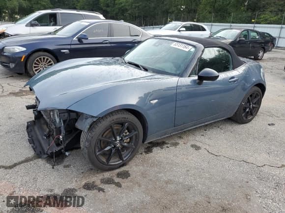✅ 2021 Mazda MX-5 Miata Club • VIN: JM1NDAC73M0452877 • Lot: 65131164. Wystawiony na Copart z przebiegiem 36 921 mil. Bezpłatny archiwum sprzedaży aukcyjnych z USA i szczegółowy raport historii pojazdu na DreamBid. Zdjęcie 1.
