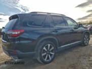 ✅ 2025 Honda Pilot Touring • VIN: 5FNYG2H70SB006333 • Lot: 93754175. Listed on Copart with Not provided. Free auction sales archive from the USA and detailed vehicle history report at DreamBid. Image 3.