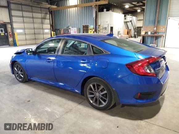 ✅ 2020 Honda Civic EX-L • VIN: 19XFC1F74LE021442 • Lot: 82461615. Listed on Copart with 99,334 mi. Free auction sales archive from the USA and detailed vehicle history report at DreamBid. Image 2.