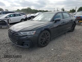 ✅ 2023 Audi S8 • VIN: WAULSAF89PN006786 • Лот: 62555985. Опубликован ранее на Copart с пробегом 83 937 миль. Бесплатный доступ к архиву аукционных продаж из США и подробный отчёт об истории автомобиля на DreamBid. Изображение 1.