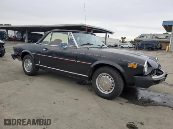 ✅ 1975 FIAT 124 Spider • VIN: 124CS10095845 • Lot: 86344634. Listed on Copart with 86,863 mi. Free auction sales archive from the USA and detailed vehicle history report at DreamBid. Image 4.