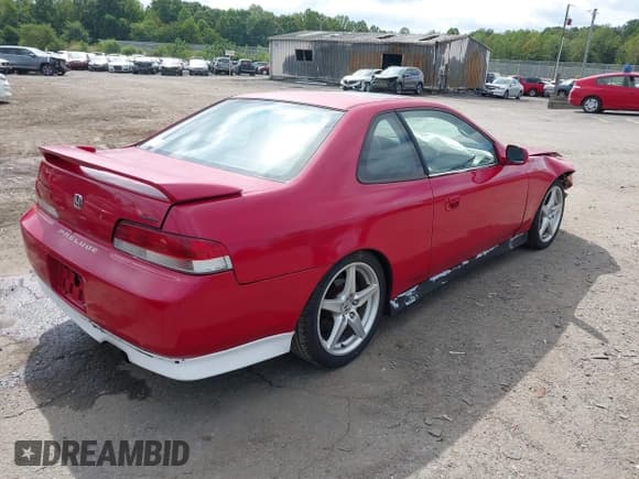✅ 1999 Honda Prelude • VIN: JHMBB6247XC010165 • Lot: 43003598. Listed on IAAI with 134,683 mi. Free auction sales archive from the USA and detailed vehicle history report at DreamBid. Image 4.