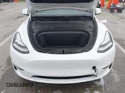 ✅ 2023 Tesla Model Y Long Range • VIN: 7SAYGDEE9PA069095 • Lot: 41986700. Listed on IAAI with 19,484 mi. Free auction sales archive from the USA and detailed vehicle history report at DreamBid. Image 10.