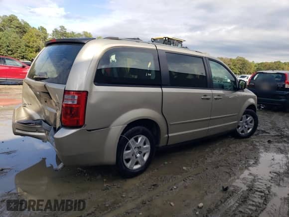 2009 Dodge Grand Caravan SE with VIN 2D8HN44E79R651812, listed as a Copart auction lot 85851955 with 253,916 mi miles and Salvage title. Bid and sale history available at DreamBid. Image 3.