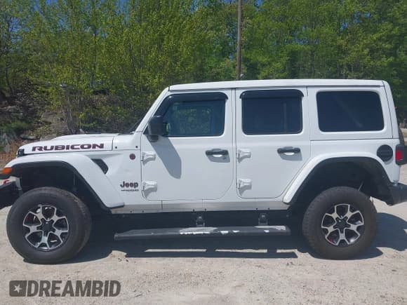 ✅ 2021 Jeep Wrangler Unlimited Rubicon • VIN: 1C4HJXFG5MW586842 • Lot: 42186683. Listed on IAAI with 76,450 mi. Free auction sales archive from the USA and detailed vehicle history report at DreamBid. Image 14.