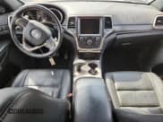 ✅ 2015 Jeep Grand Cherokee Limited • VIN: 1C4RJFBMXFC862057 • Lot: 80527565. Listed on Copart with 118,182 mi. Free auction sales archive from the USA and detailed vehicle history report at DreamBid. Image 8.