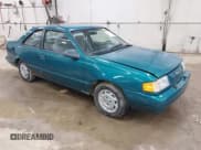 ✅ 1994 Ford Tempo • VIN: 1FAPP31X6RK108511 • Lot: 42004445. Listed on IAAI with 3,310 mi. Free auction sales archive from the USA and detailed vehicle history report at DreamBid. Image 1.