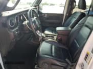 ✅ 2021 Jeep Wrangler Unlimited Sahara • VIN: 1C4JJXP63MW720948 • Lot: 57115825. Listed on Copart with 33,391 mi. Free auction sales archive from the USA and detailed vehicle history report at DreamBid. Image 7.