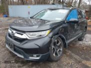 ✅ 2019 Honda CR-V Touring • VIN: 2HKRW2H99KH602129 • Lot: 43855817. Listed on IAAI with 91,135 mi. Free auction sales archive from the USA and detailed vehicle history report at DreamBid. Image 6.