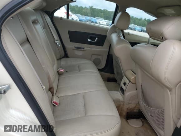 ✅ 2004 Cadillac CTS • VIN: 1G6DM577X40164953 • Lot: 70134254. Listed on Copart with 229,874 mi. Free auction sales archive from the USA and detailed vehicle history report at DreamBid. Image 10.