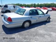 ✅ 2003 Ford Police Interceptor Street Appear • VIN: 2FAFP71W93X101292 • Lot: 40263949. Listed on IAAI with 255,111 mi. Free auction sales archive from the USA and detailed vehicle history report at DreamBid. Image 4.