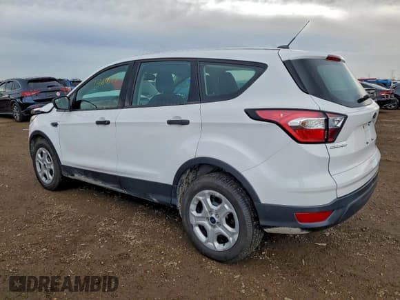 ✅ 2018 Ford Escape S • VIN: 1FMCU0F70JUD01301 • Lot: 93354925. Listed on Copart with 67,129 mi. Free auction sales archive from the USA and detailed vehicle history report at DreamBid. Image 2.