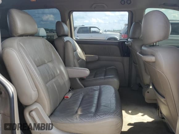 ✅ 2003 Honda Odyssey EX-L • VIN: 5FNRL18963B086072 • Lot: 62819585. Wystawiony na Copart z przebiegiem 133 210 mil. Bezpłatny archiwum sprzedaży aukcyjnych z USA i szczegółowy raport historii pojazdu na DreamBid. Zdjęcie 11.