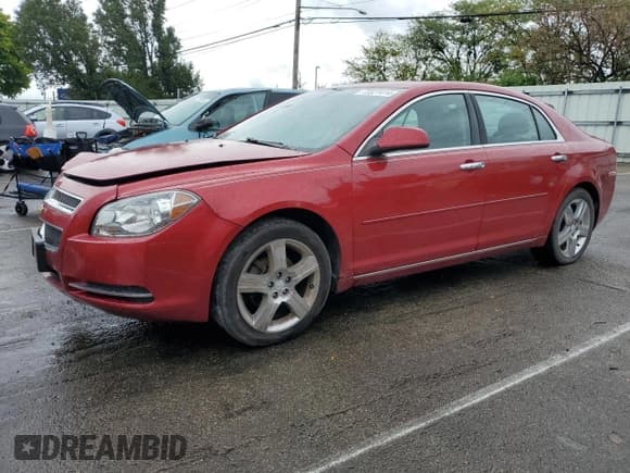 ✅ 2012 Chevrolet Malibu 1LT • VIN: 1G1ZC5E02CF298307 • Lot: 73321414. Listed on Copart with 153,345 mi. Free auction sales archive from the USA and detailed vehicle history report at DreamBid. Image 1.