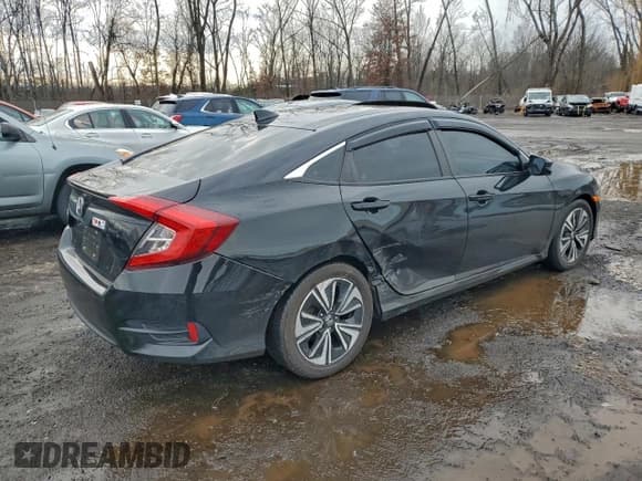 ✅ 2018 Honda Civic EX-T • VIN: 19XFC1F30JE200880 • Lot: 94308995. Wystawiony na Copart z przebiegiem 141 970 mil. Bezpłatny archiwum sprzedaży aukcyjnych z USA i szczegółowy raport historii pojazdu na DreamBid. Zdjęcie 3.