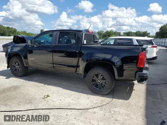 ✅ 2021 Chevrolet Colorado 2WD Z71 • VIN: 1GCGSDEN5M1101443 • Лот: 66133975. Опубликован ранее на Copart с пробегом 87 668 миль. Бесплатный доступ к архиву аукционных продаж из США и подробный отчёт об истории автомобиля на DreamBid. Изображение 2.