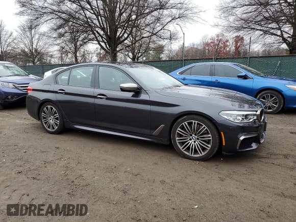 ✅ 2018 BMW 5 Series M550i xDrive • VIN: WBAJB9C58JB035401 • Лот: 93097145. Опубликован ранее на Copart с пробегом 48 309 миль. Бесплатный доступ к архиву аукционных продаж из США и подробный отчёт об истории автомобиля на DreamBid. Изображение 4.