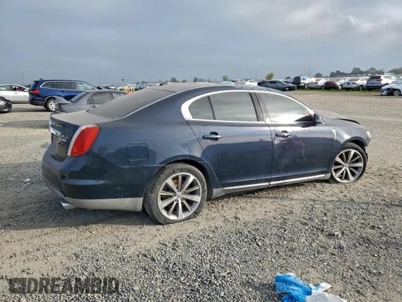 ✅ 2009 Lincoln MKS • VIN: 1LNHM94R99G601041 • Lot: 95194785. Listed on Copart with Not provided. Free auction sales archive from the USA and detailed vehicle history report at DreamBid. Image 3.