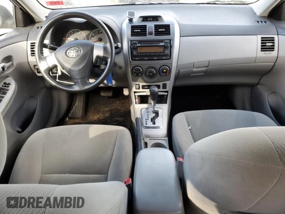 ✅ 2012 Toyota Corolla L • VIN: 2T1BU4EE8CC855810 • Lot: 75913044. Listed on Copart with 132,103 mi. Free auction sales archive from the USA and detailed vehicle history report at DreamBid. Image 8.