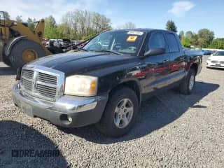 2005 Dodge Dakota SLT with VIN 1D7HE48K95S194742, listed as a Copart auction lot 56401485 with 211,957 mi miles and Salvage title. Bid and sale history available at DreamBid. Image 1.